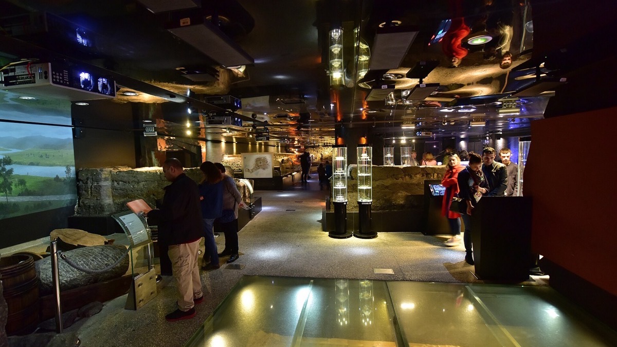 The underground Rynek museum beneath Kraków's Main Square, with glass floors over medieval foundations.